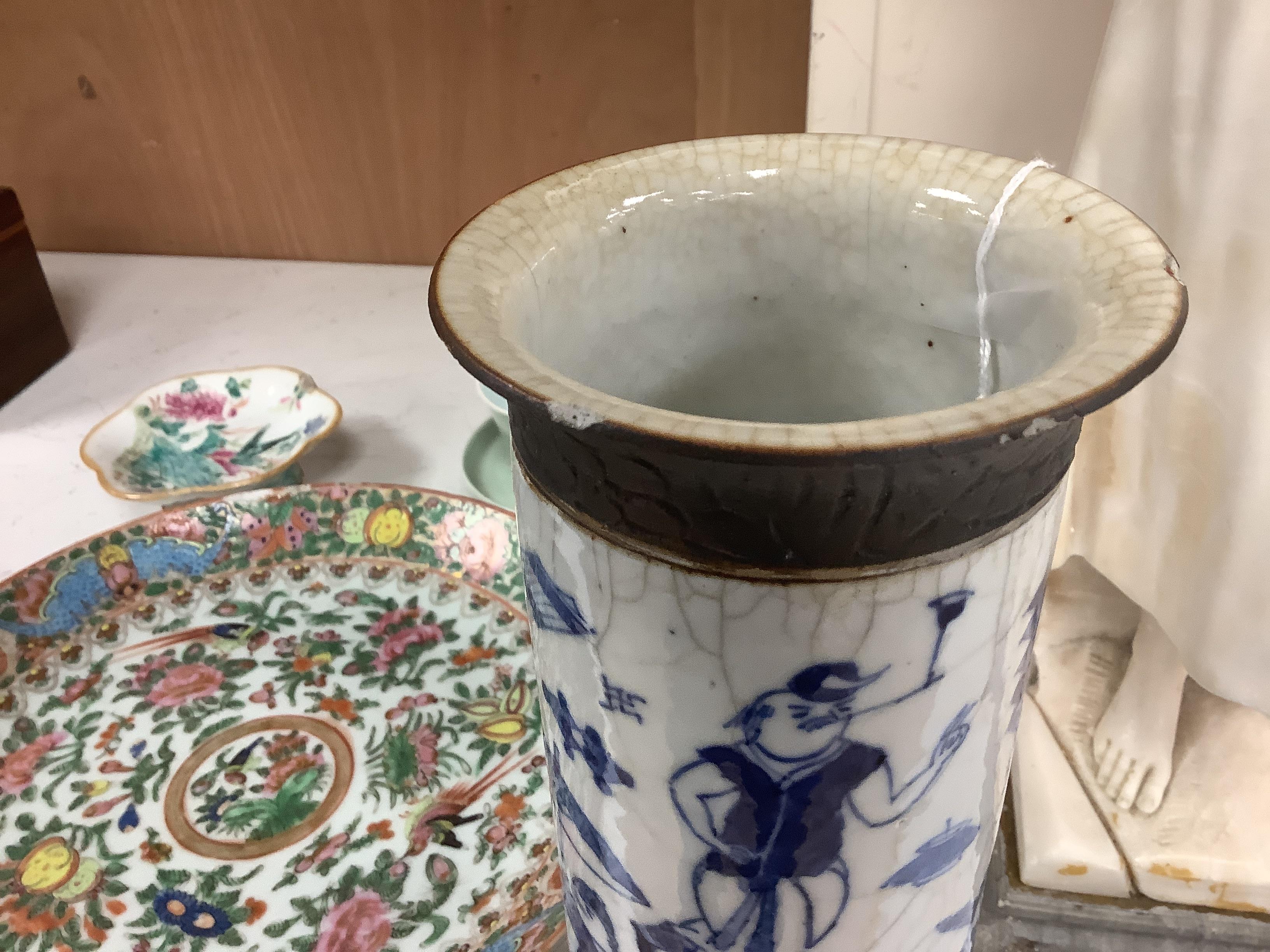 Five Chinese porcelain items including a blue and white crackle glaze cylindrical vase and a celadon glaze tea bowl and stand, largest 29cm in diameter